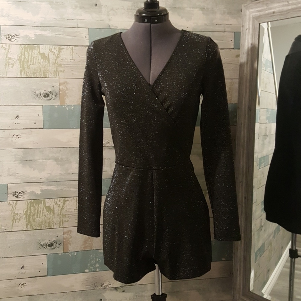 Black glitter long sleeved Romper